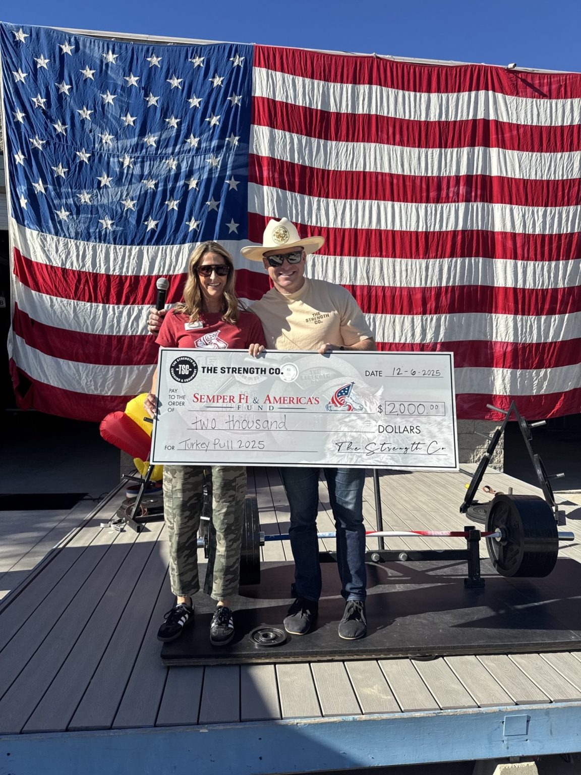 Presenting a $2,000 check to the Semper Fi & America's Fund at the Turkey Pull 2025